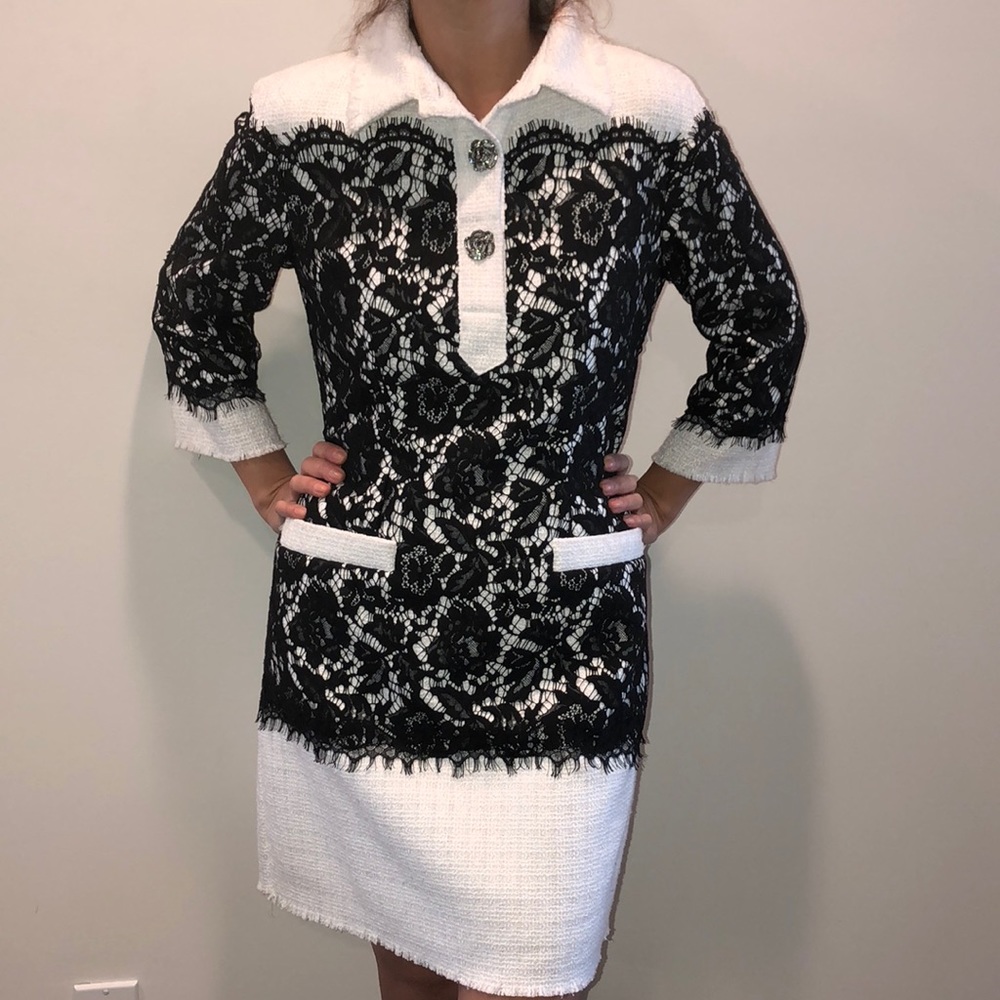 Stunning off white classic dress with black lace.